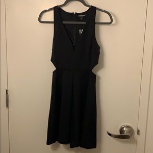 Great little black dress! Slit on the sides.